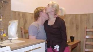 Petite blonde is sitting on her boyfriend's laps and getting kissed
